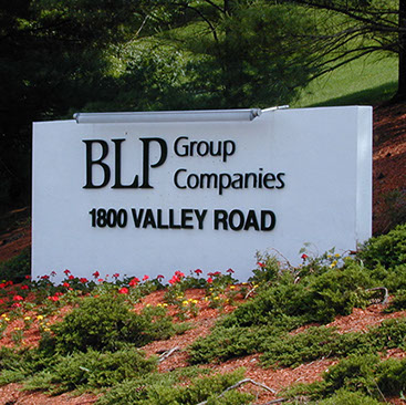 flat laser cut acrylic letters mounted on monument sign