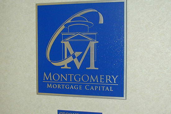 cast aluminum plaque with raised letters and logo sign