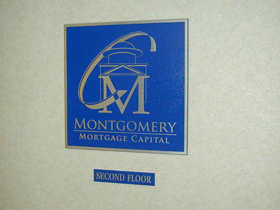 cast aluminum plaque with raised letters and logo sign