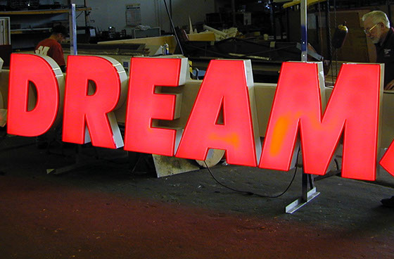 Channel Letter sign being tested in the shop