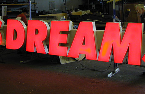 Channel Letter sign being tested in the shop