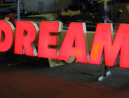 Channel Letter sign being tested in the shop