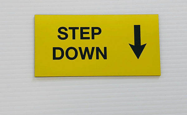 Yellow acrylic piece with black engraved