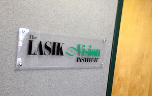 Cut Vinyl on acrylic sign mounted with stand offs