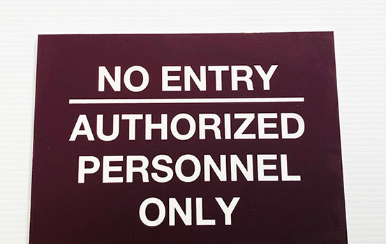 Burgundy acrylic piece with white engraving