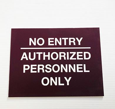 Burgundy acrylic piece with white engraving