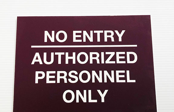 Burgundy acrylic piece with white engraving